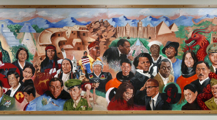 The Ethnic Studies mural featuring portraits of important historical figures 
