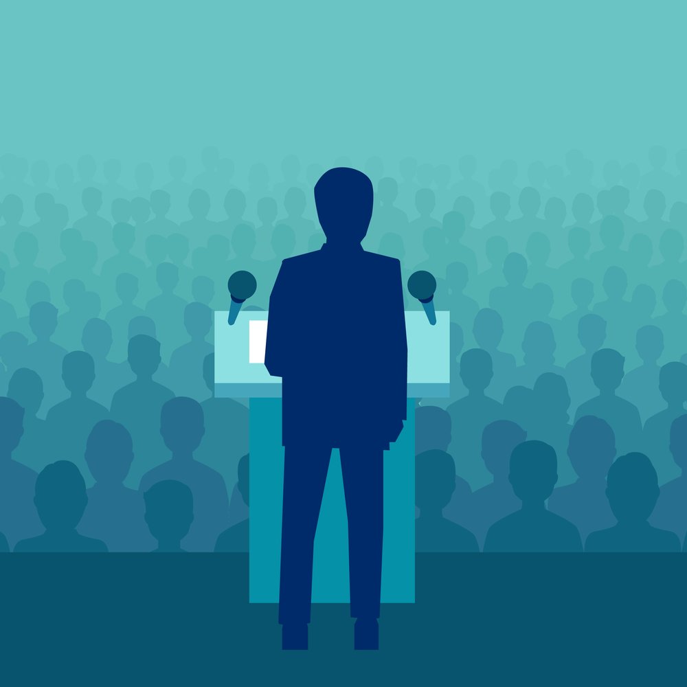Graphic of individual speaking in front of a podium and a large crowd