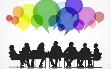A graphic illustration of the silhouette of a panel of people sitting around a table with different colored speech bubbles above them