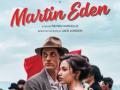 The 'Martin Eden' film poster featuring two people holding one another in front of a red flag and group of people in an outdoor setting