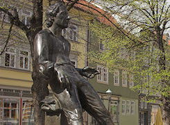 A Statue of Bach in an urban area