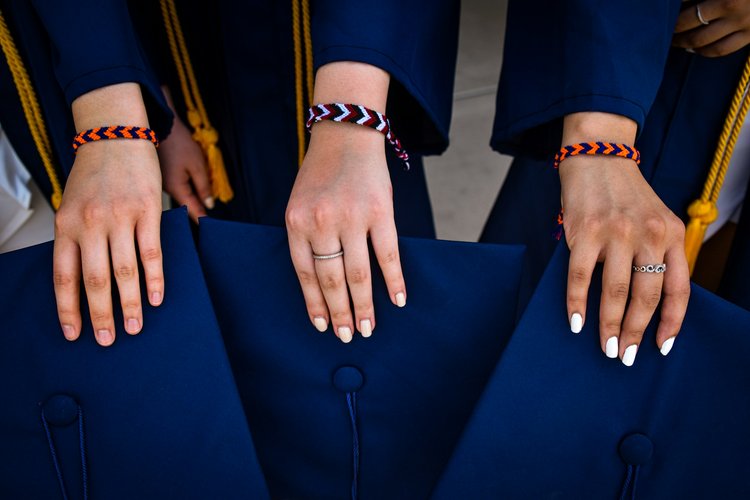 People wearing friendship bracelets