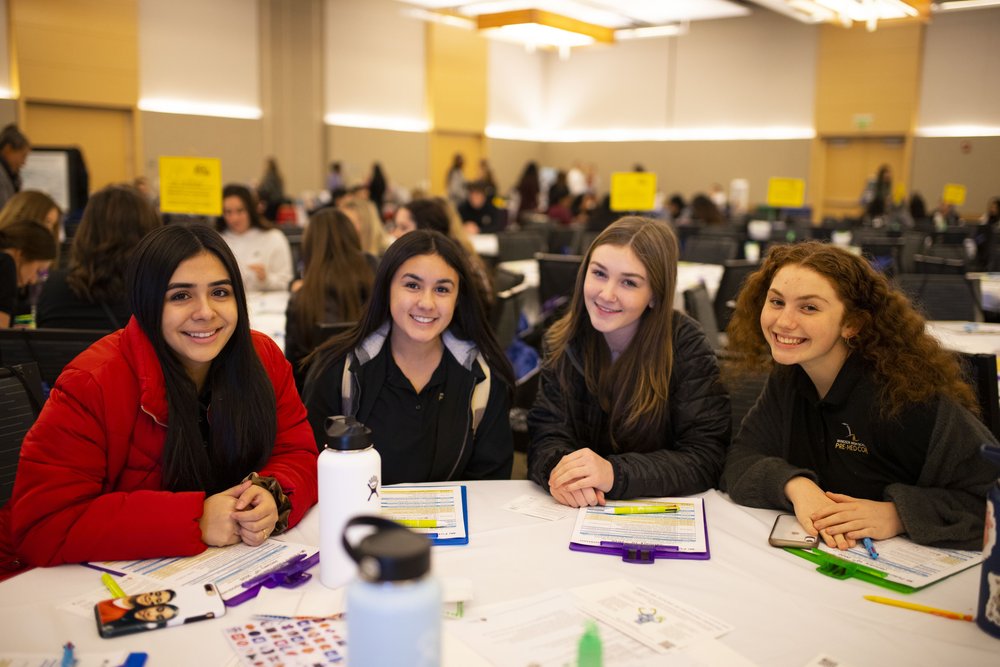 Students sitting together at an event in Ballroom A