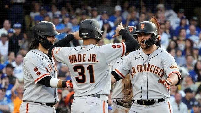 San Francisco Giants players celebrating with each other during a game