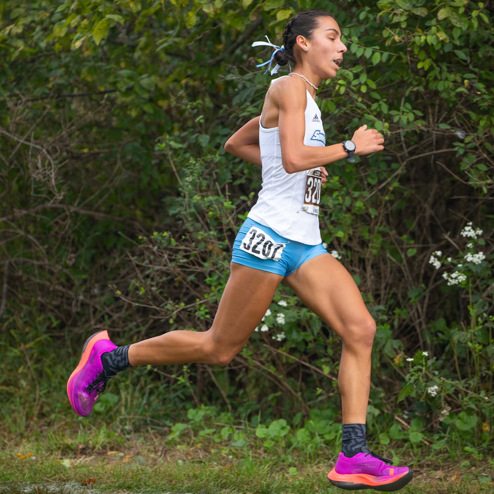 A track runner running