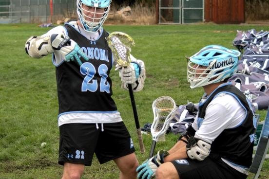 Lacrosse players posing for photo