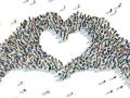 An aerial graphic of a crowd of people forming together to create the shape of two hands put together to form a heart