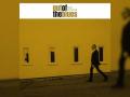 The album cover of Boz Skaggs 'Out of the Blues' featuring a yellow tinted photograph of Boz walking in front of a building