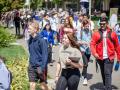 large group of SSU students walking toward Seawolf Plaza