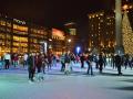 People ice skating at Union Square at night
