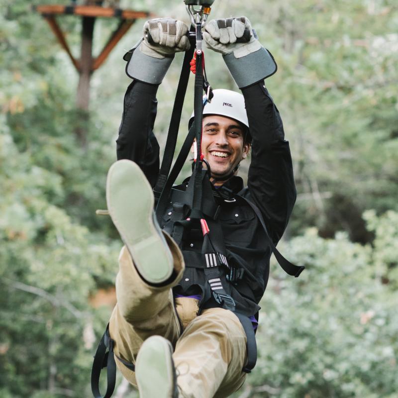 student on a zip line