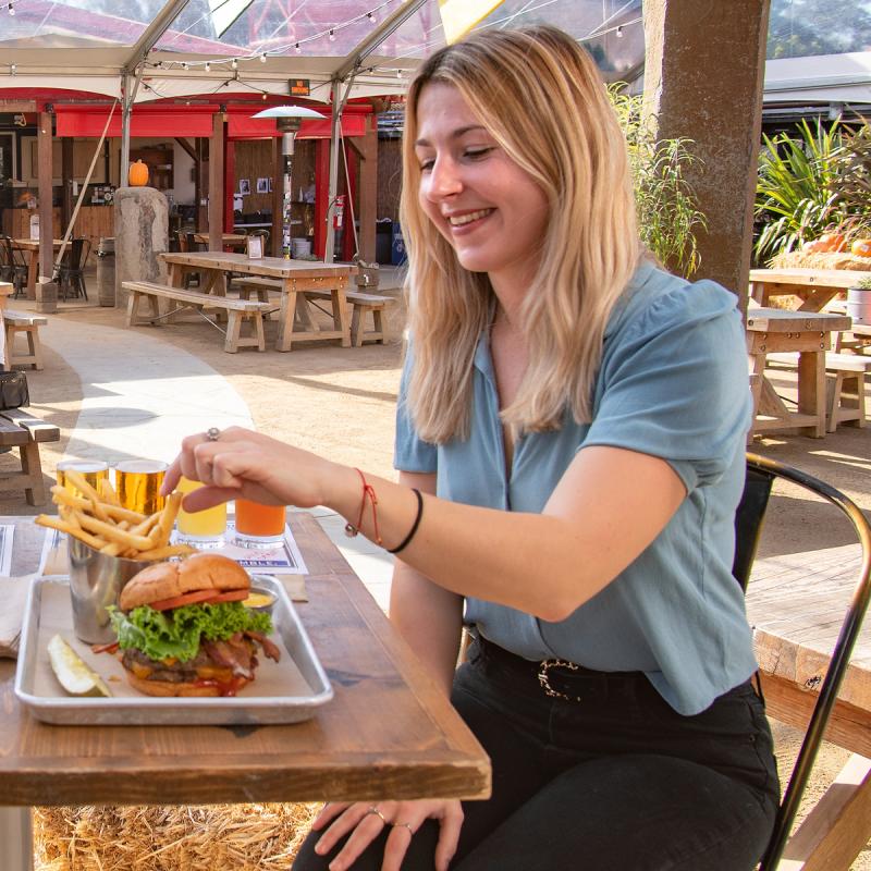 Student having dinner at a brewery