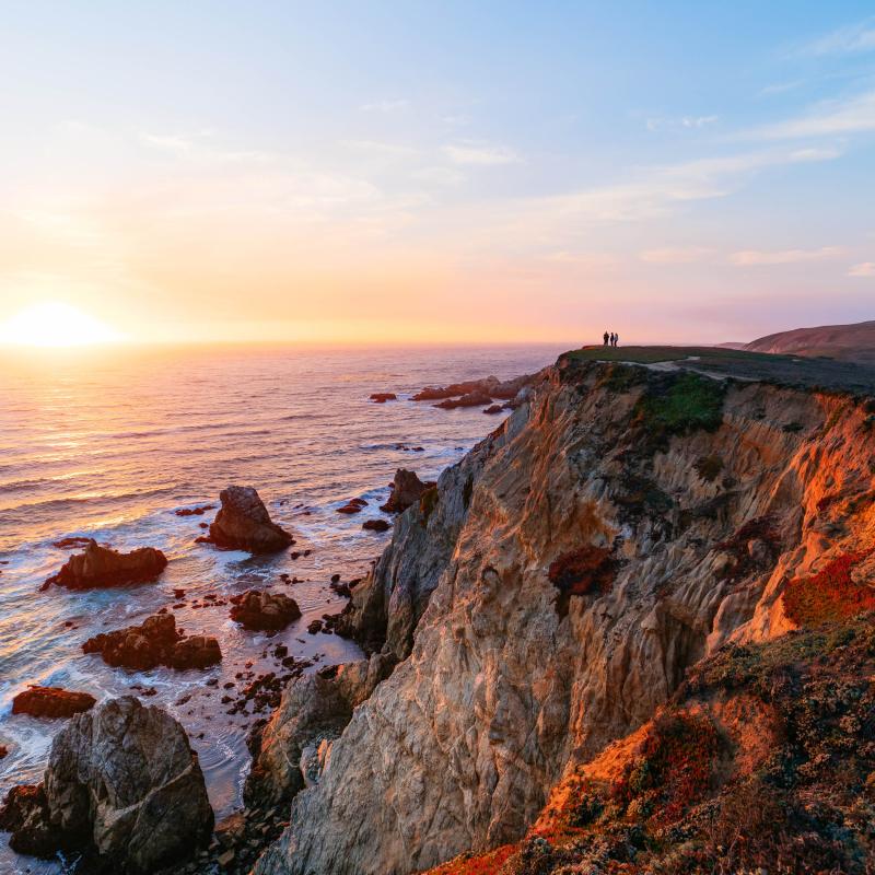 Sonoma County Coastline at sunset time with water and rocks on a peak